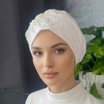 MIMOUNT COUTURE Pearl Bloom white bridal hijab turban featuring decorative pearl trim